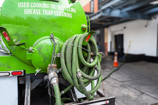 septic tank pump truck in operation in Dorsey